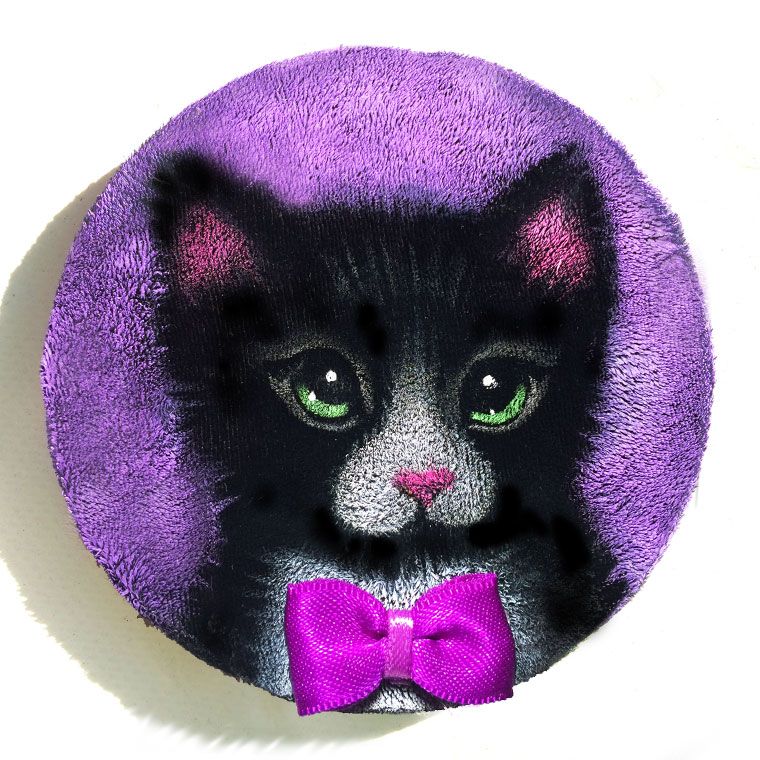 Coaster: Pee Wee. A black and white kitten with green eyes, a pink nose and a magenta ribbon bow tie on a lavender background, painted on round black velvet.